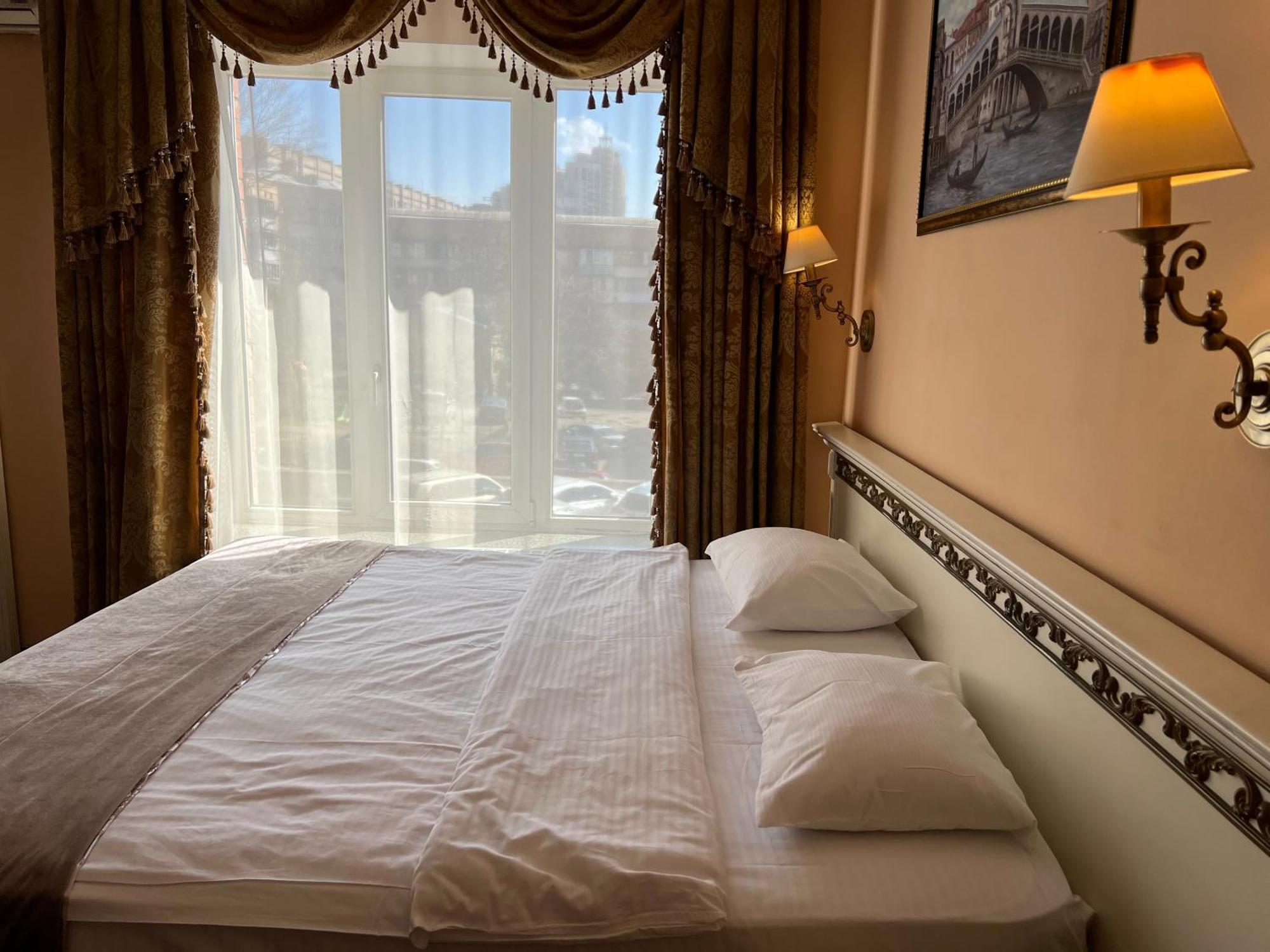 Royal City Hotel Kiev Quarto foto