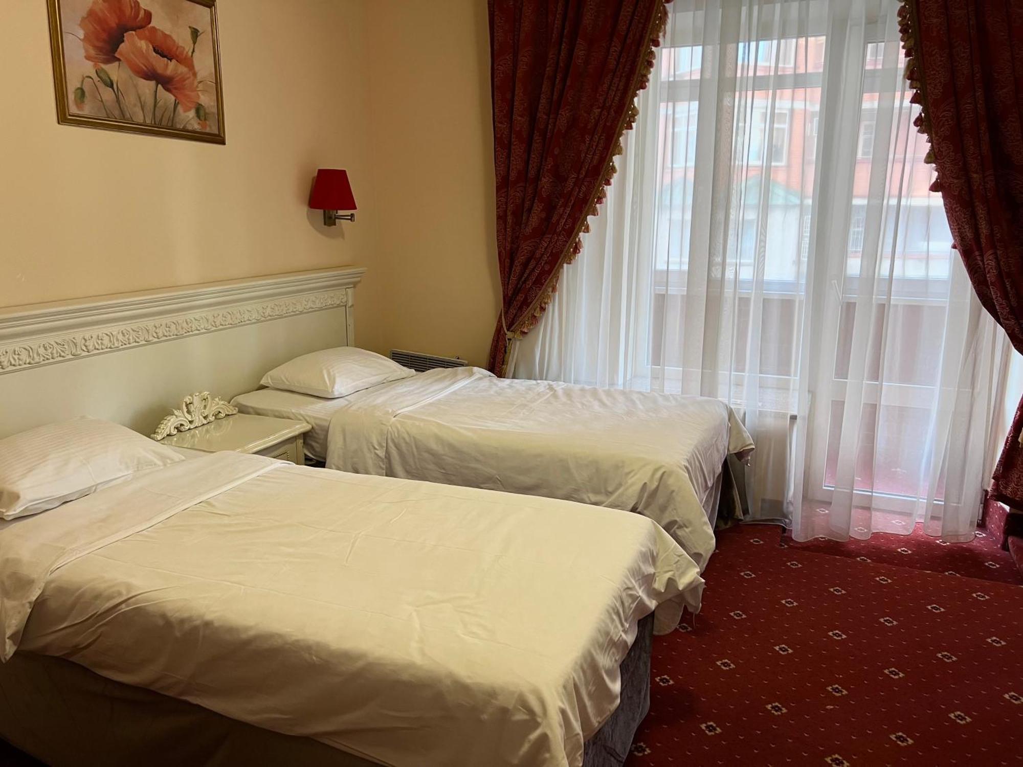 Royal City Hotel Kiev Quarto foto